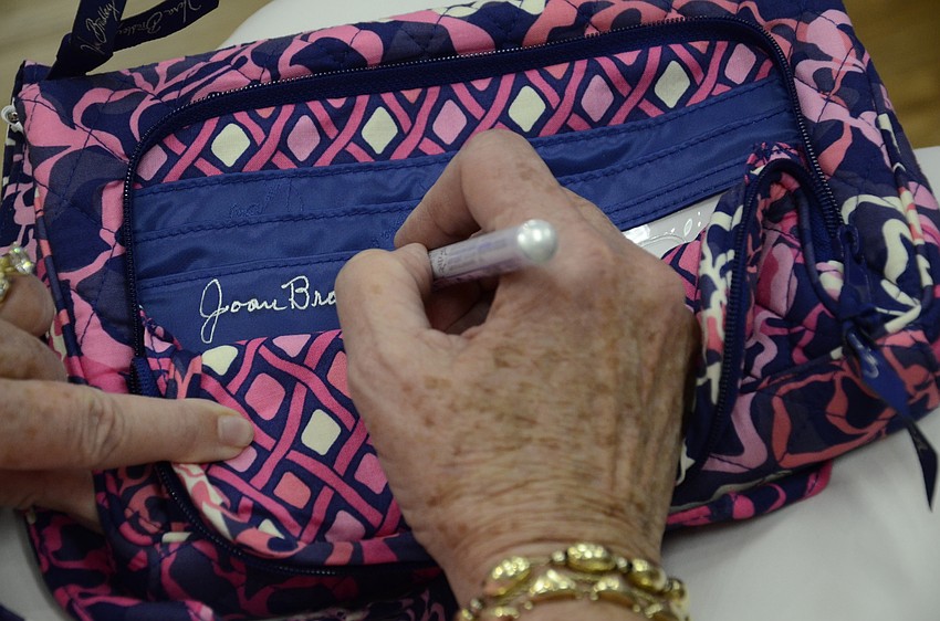 Joan Bradley signed items for customers who purchased a Very Bradley product during the event.