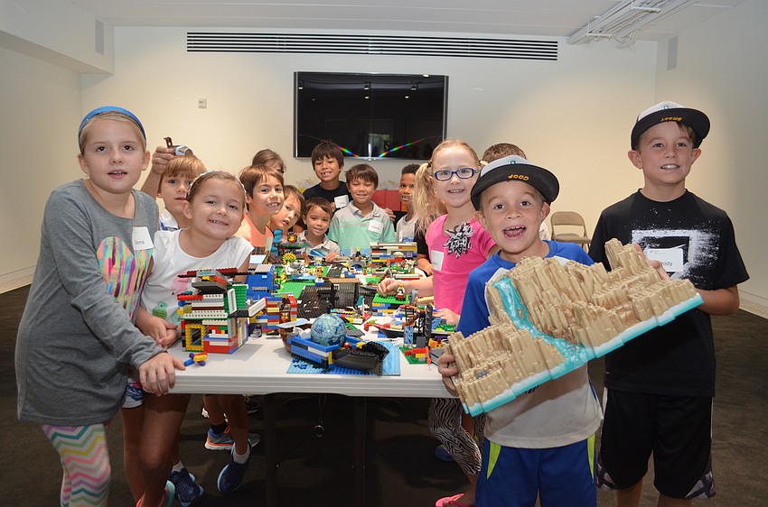 All the students showing off their LEGO houses and buildings.
