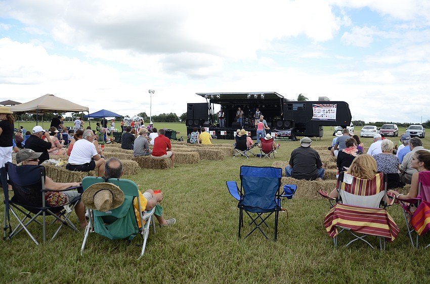 Attendees pulled up a chair to listen to local bands while enjoying their brews.