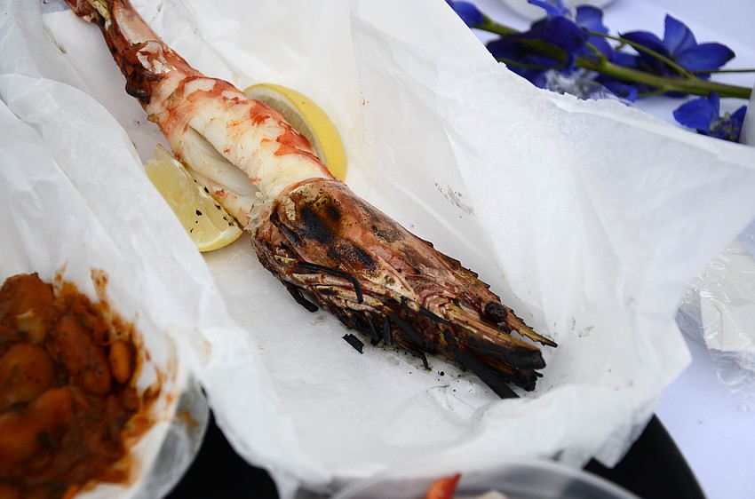 Blu Kouzina offered giant prawns on their booth's menu.