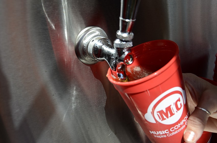 Kristin Pufta pours a brew.