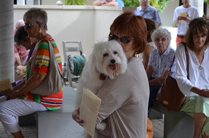 Samantha snuggles her handler Meliss Swenson.
