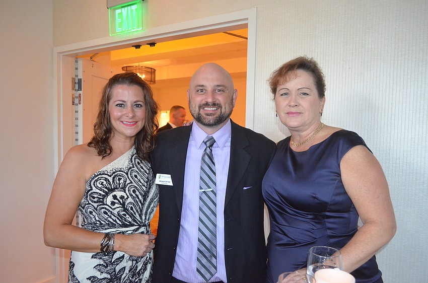 Christina Lubin, Payton Foundation Board Member Brian Porter and Kathleen Grate
