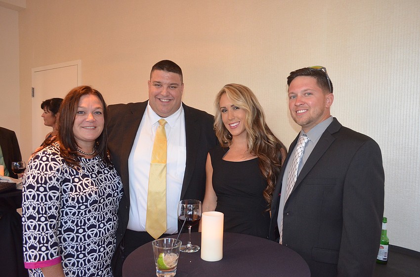 Jeanine and Craig Livingston and Megan and Brendan Daveluy