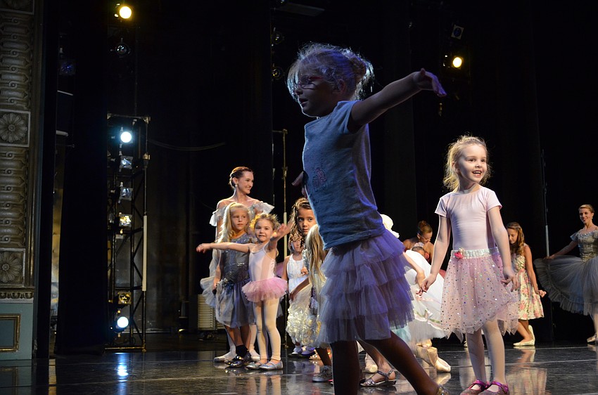 Giania DiGiovanni basks in the energy of the audience and bows to her admirers.