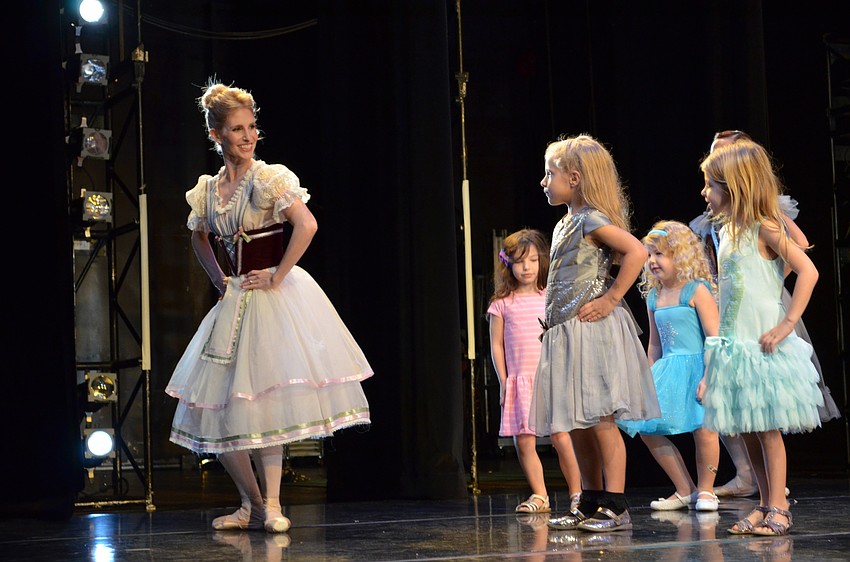 Sarasota Ballet Principal dancer Kate Honea leads dancers on stage.