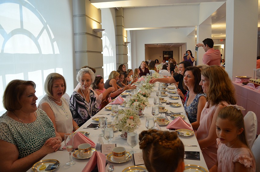 Guests toasted with tea at Tea and Tutus.