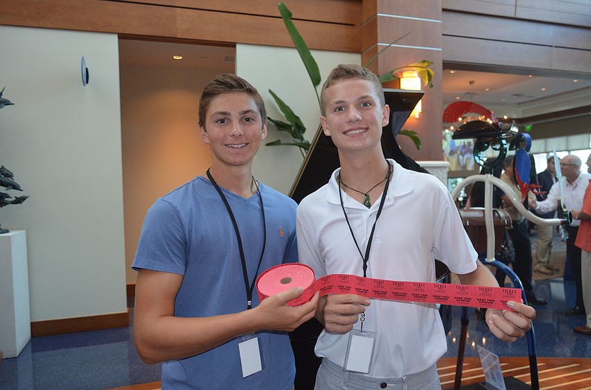 Sarasota Bay Watch student volunteers Harrison Schofield and Park Dietz