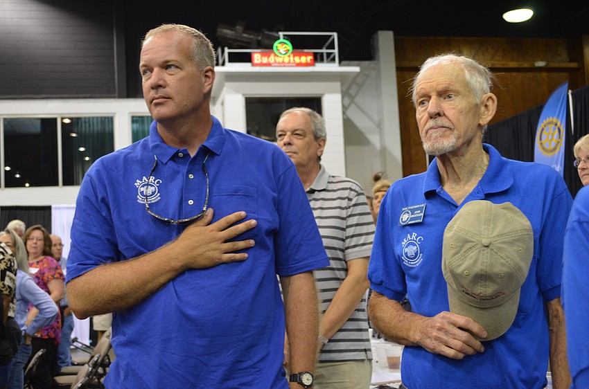Aaron Bokelmann and John Anderson during the presentation of the colors.