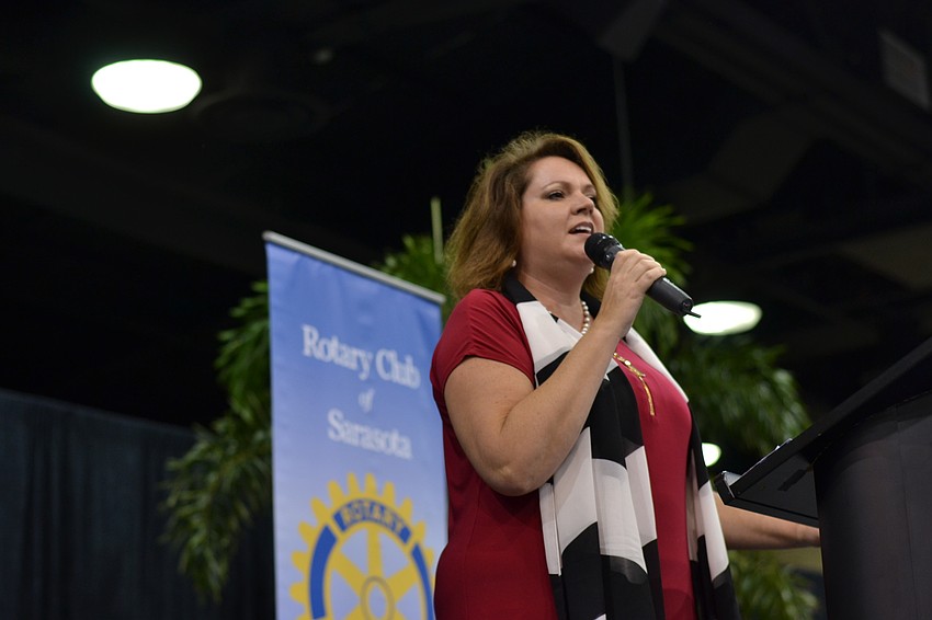 Goodwill Foundation Vice President Veronica Brandon Miller performs the national anthem to start the picnic.