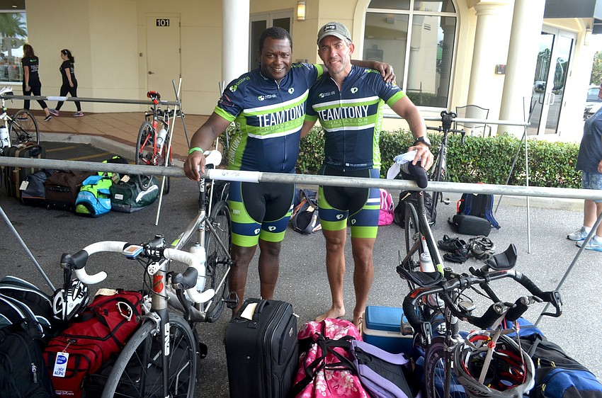 Robert Fenderson and Ben Hanan relax after a lengthy bike ride.
