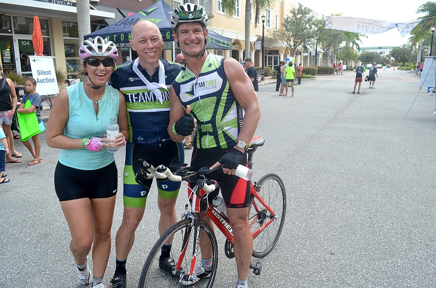 Elena Mase and Michael Belle greet Jeff Mase after his return from a two-day trip.