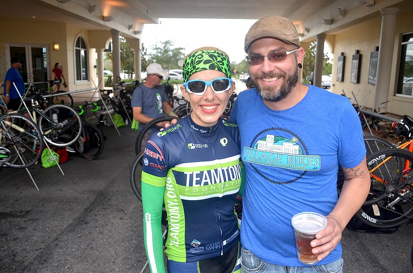 Yaniris Avellanet is greeted by her friend Craig Prather.