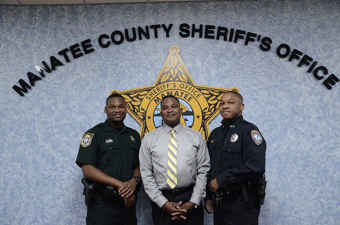 Lorenzo Jr., left, is a member of the Sheriff's Office; Cory, right, has joined the Bradenton Police Department.