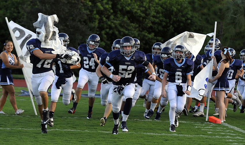 The Out-of-Door Academy football team takes the field in its district game versus Bradenton Christian Oct. 2.