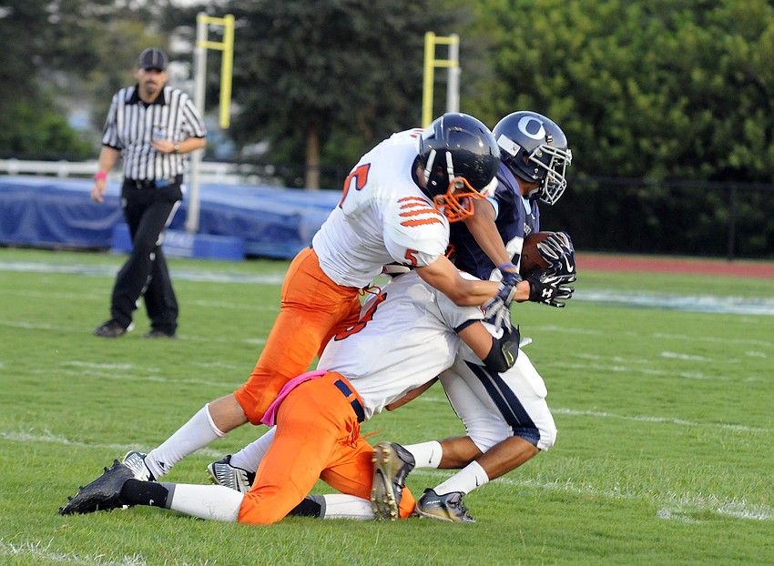 ODA freshman wide receiver Austin Brinling hauls in a catch for a first down early in the first quarter.