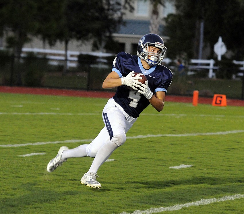 ODA senior Trenton Radigan returns a kickoff in the first quarter.