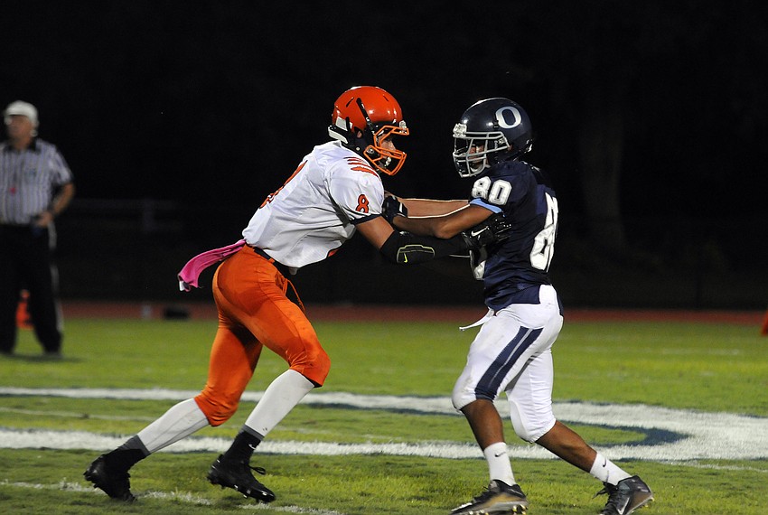 Bradenton Christian's Kevin Etienne defends ODA's Austin Brinling in the first half.