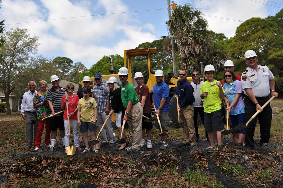 Community Haven and other officials and future Marleneâ€™s House residents toss dirt for a ceremonial ground-breaking ceremony March 5.