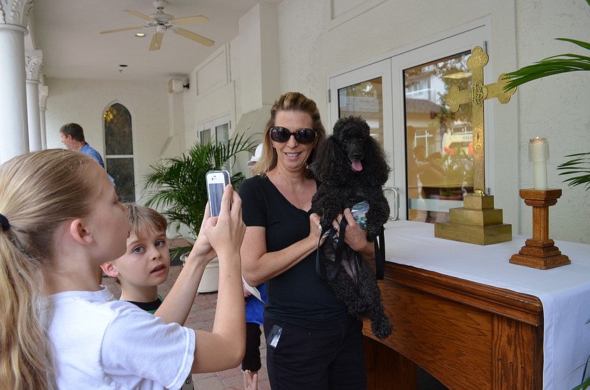 Janice Belcher and Kizzy have their photo taken.