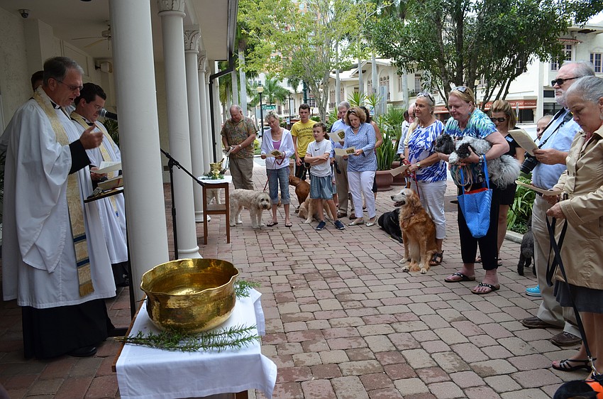 Guests gathered on the front patio of Church of the Redeemer for the Animal Blessing ceremony.