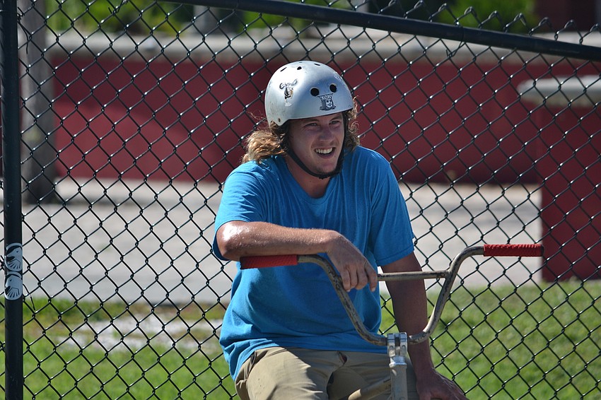Frank Clark waits for his turn to ride.