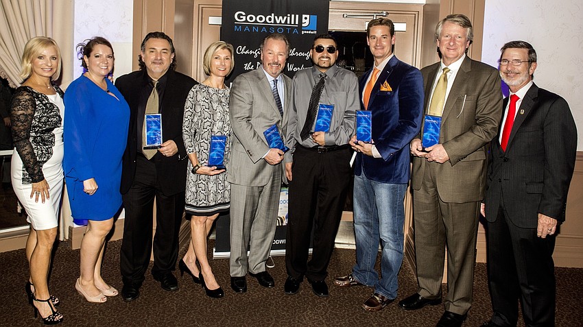 The Goodwill Ambassadors of the Year with Goodwill's executive organizing team, Vernica Brandon MIller, Bob Rosinsky, emcee Lulu and employee of the year Leonzo Gonzalez