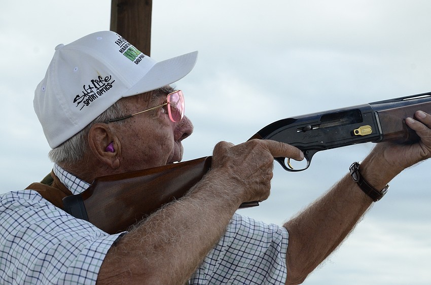 Russ Miles eyes a clay before shooting.