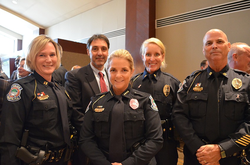 Center: Sarasota Police Department Chief of Police Bernadette  DiPino with Corinne Stannish, Ed Brodsky, Lori Jaress and Kevin Stiff.