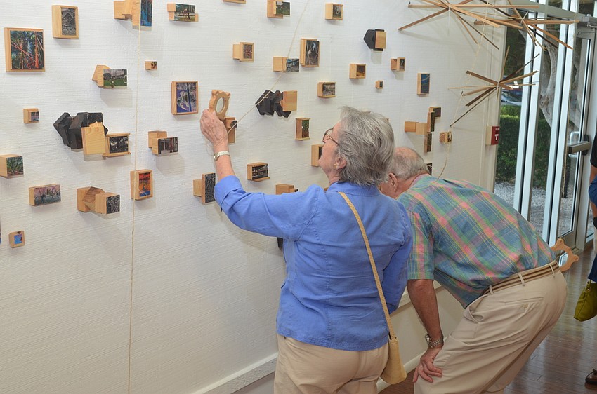 Art fans enjoying the diverse array of art by the SARTQ artists including this piece titled 