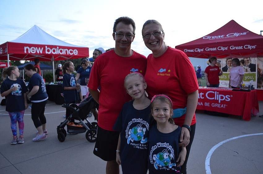 Mark and Daniela Heimgartner with their daughters Vivian and Noemi.