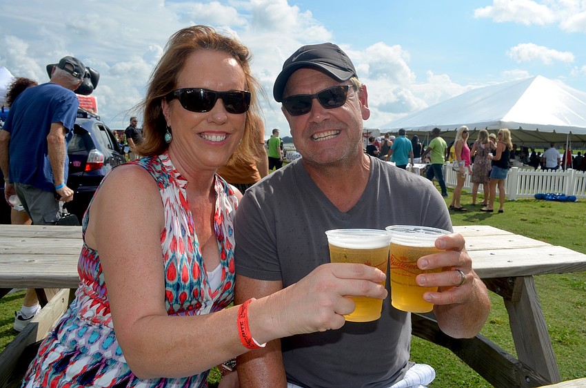 Jane and Bobby Weber toast to a fun afternoon.