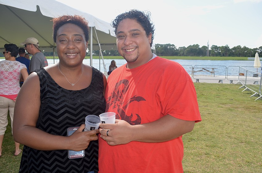 Brittany Lizotte and Steven Montanez enjoy cold drinks and time with friends.