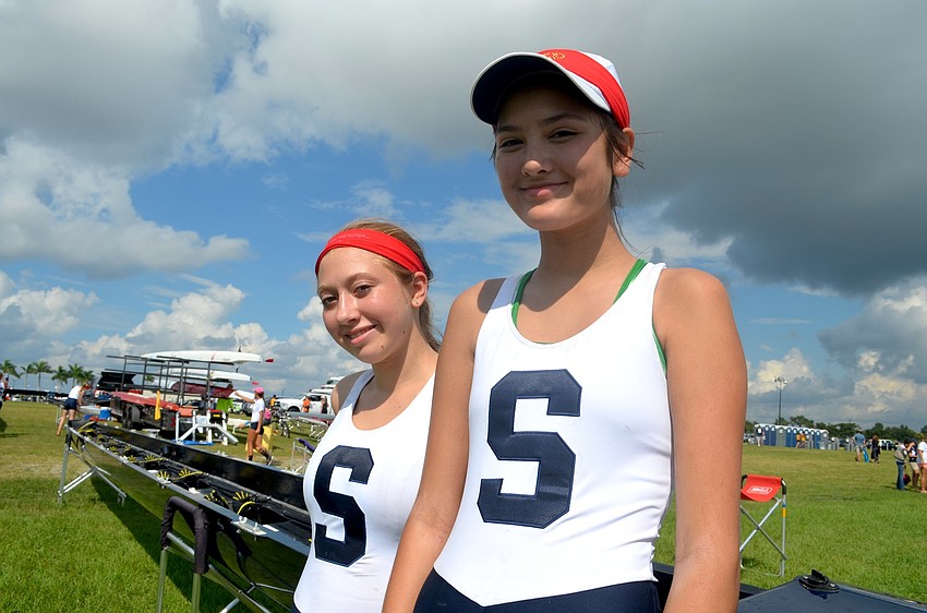 Sarasota Crew members Victoria Poplawski and Chloe Ammeson relax after an afternoon of racing.
