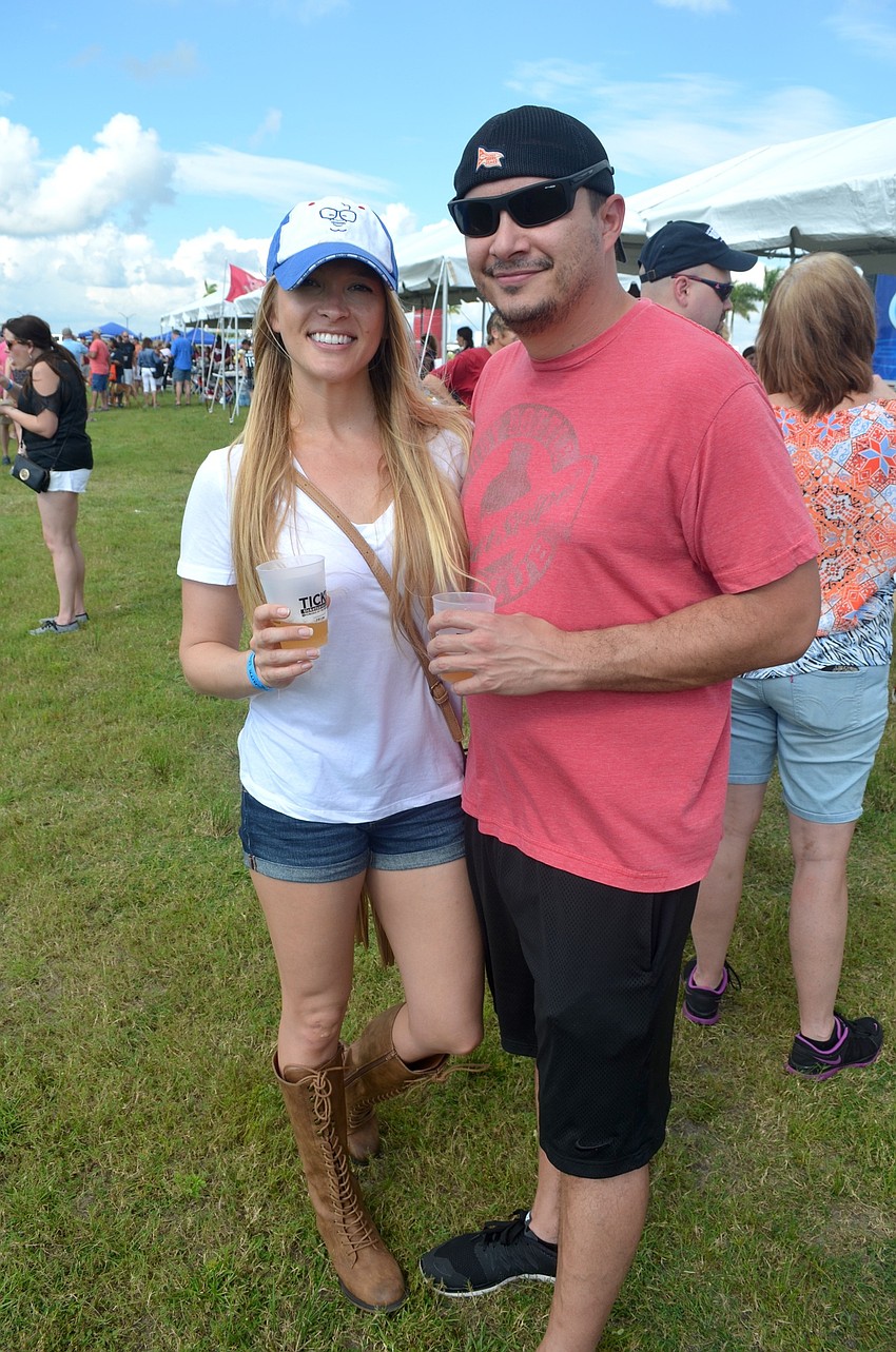 Ashley Stewart and Silvio Tassotti feast on craft beer samples.