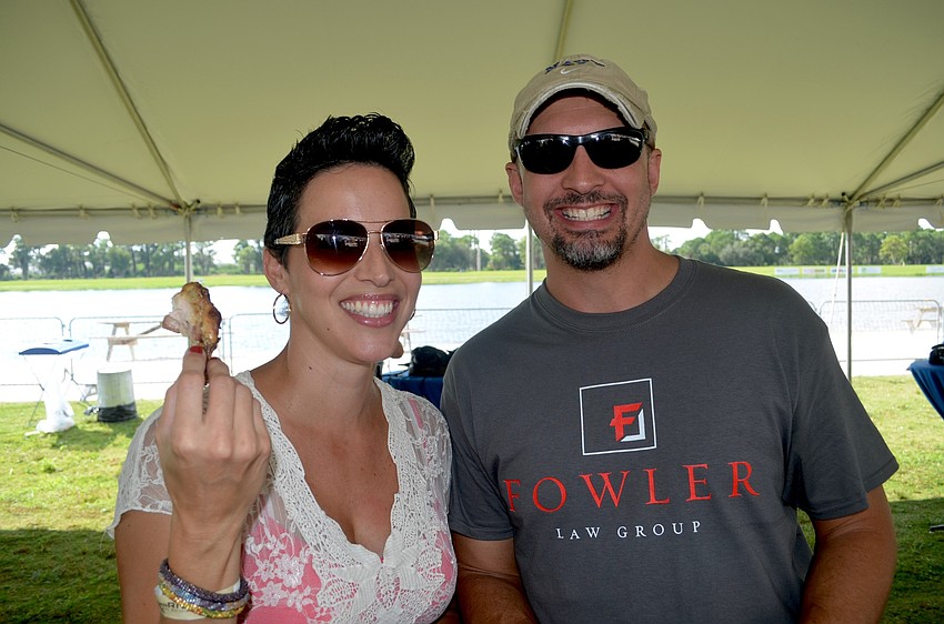 Jennifer and Chance Craig snack on bacon-topped chicken wings and other munchies.