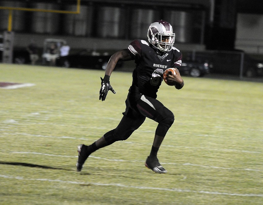 Riverview running back Areon Green carries the ball for a first down.