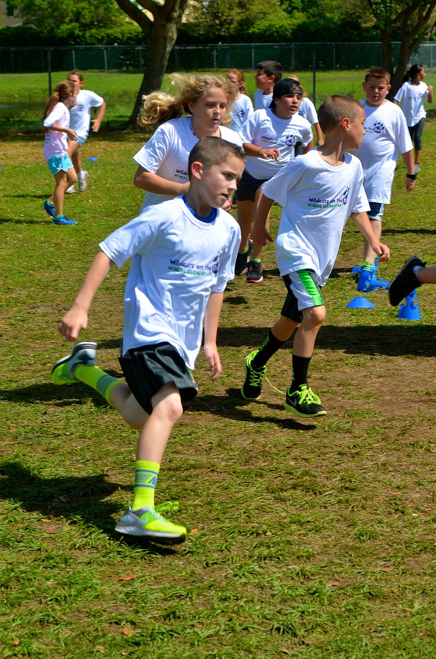 Jack Amorosi, 10, saves his energy for later laps.