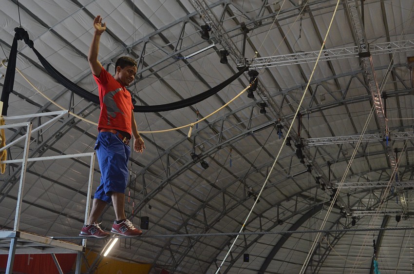 Phare: The Cambodian Circus plays around on the high wire at the Sailor Circus Academy.