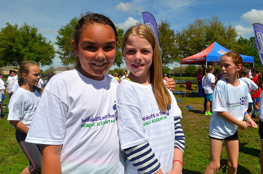 Emma O'Brien and Heaven Miller enjoy some downtime after the Fun Run ends.