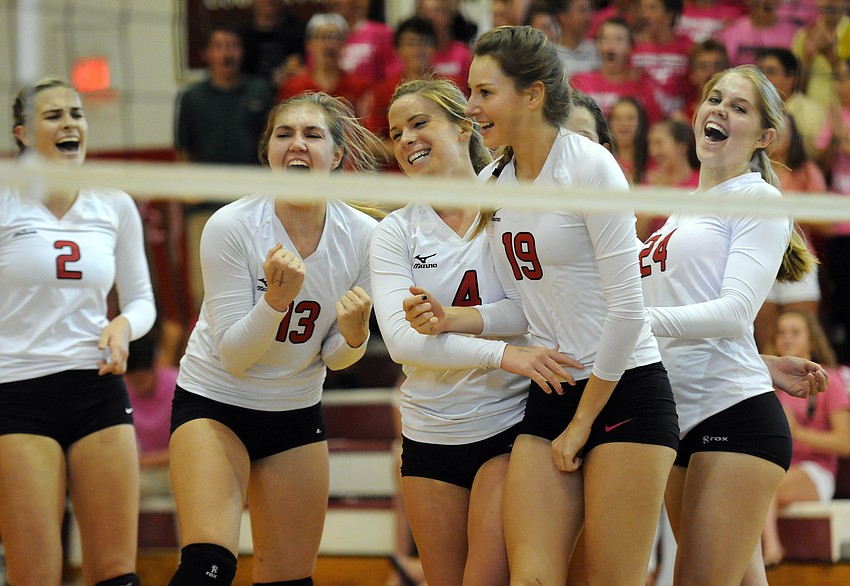 The Cardinal Mooney volleyball team celebrates a point during its match with Sarasota Christian Oct. 13.