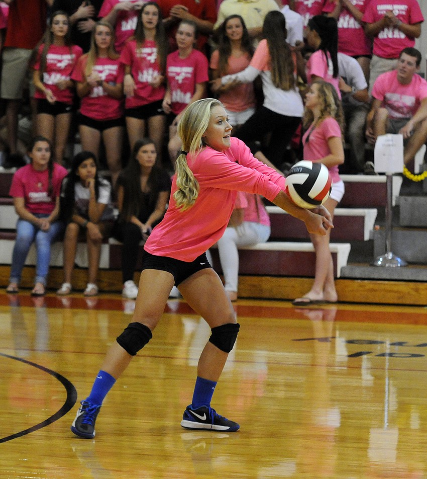 Sarasota Christian's McKenzie Lantz passes the ball back up to the front row.