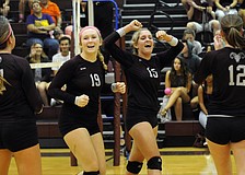 The Riverview High volleyball team celebrates a point during its 3-0 victory versus Sarasota Oct. 14.