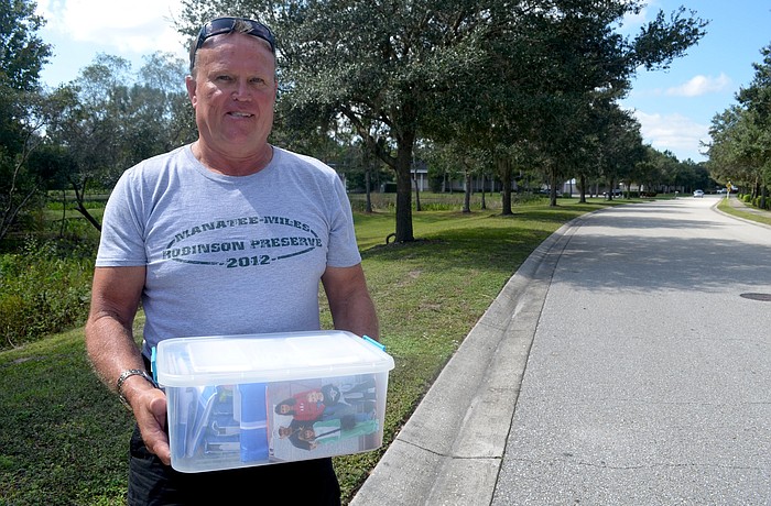 David Dillard found a bin of family photos while riding his bike on Portal Crossing.