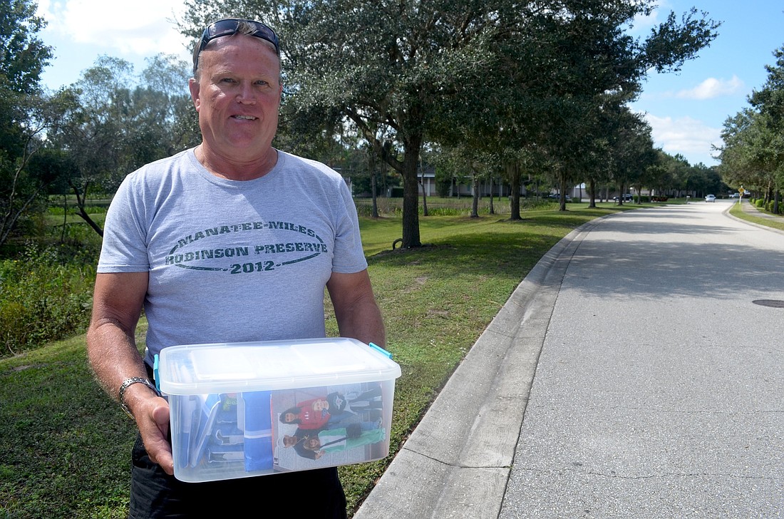 David Dillard found a bin of family photos while riding his bike on Portal Crossing.