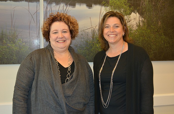 Outgoing Town Hall Executive Director Eva Rey welcomes incoming Executive Director Anne Ross, who attended board meetings on a vacation day.