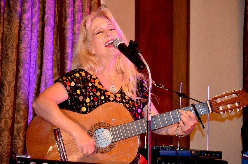 Tahja Harrison sings a range of songs from varying cultures for attendees.