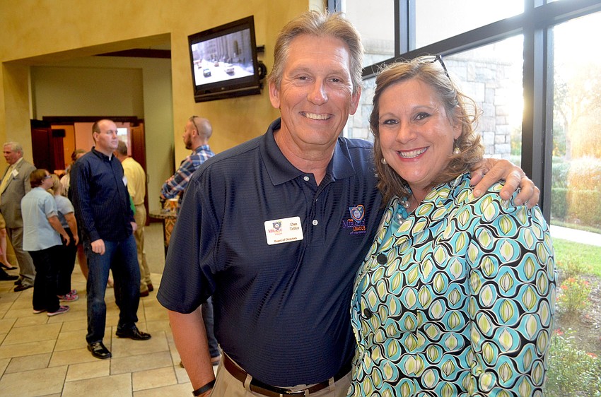 Dan and Laura Tellor, of the Miracle League of Manasota, wait for the music and dancers to perform.