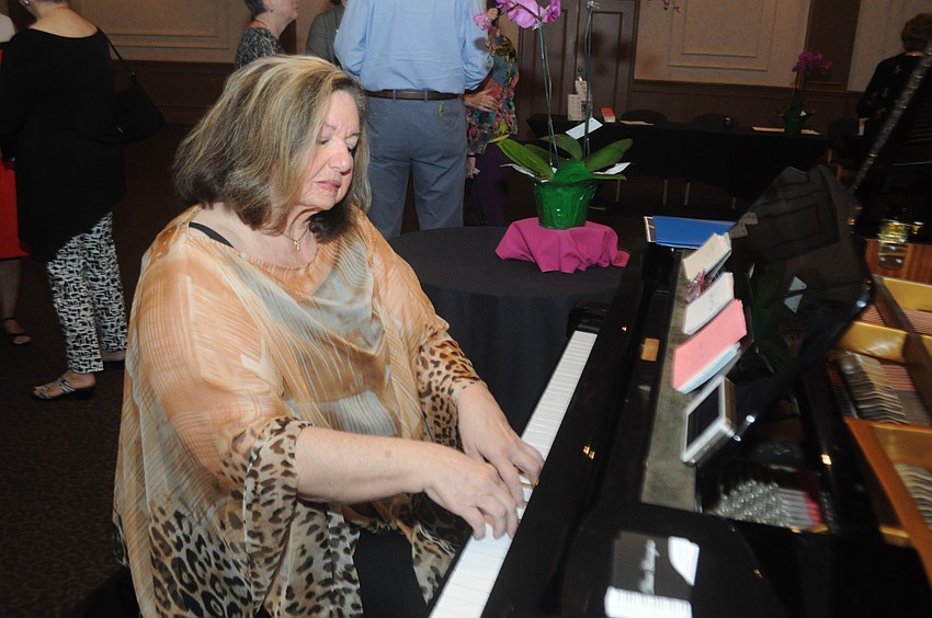 Diana Harrington provided entertainment during the social period before lunch.