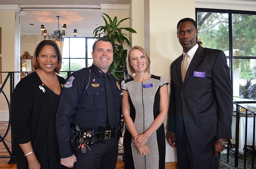 Commissioner Shelli Eddie, Sarasota Police Department Deputy Chief Pat Robinson, SPARCC President and CEO Jessica Hays and Aaron Bellamy, male engagement coordinator for SPARCC.